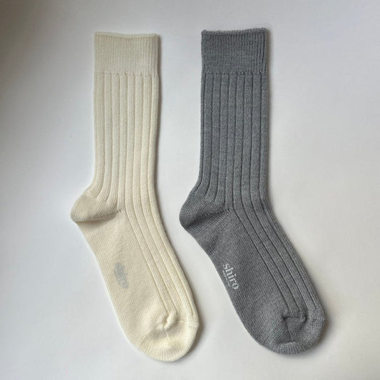A pair of cream & heather grey merino socks. Made in Italy.